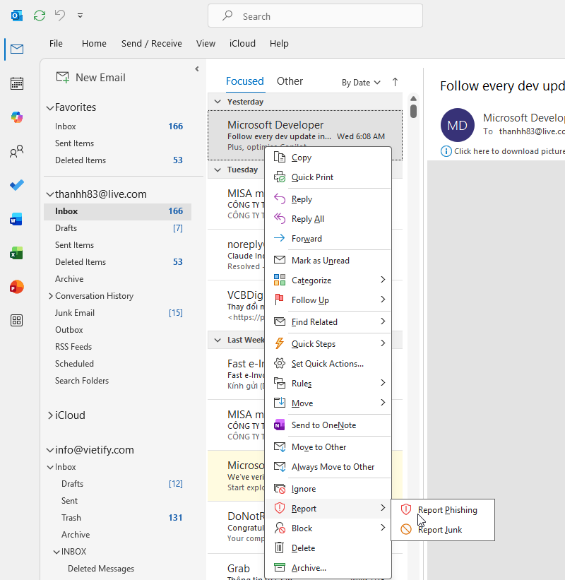 Report button in the Outlook toolbar for reporting a phishing email